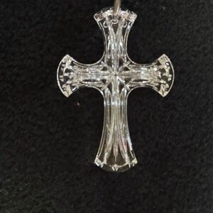 Beautiful detailed 2.25 inch lucite cross pendent on 24” black satin cord
